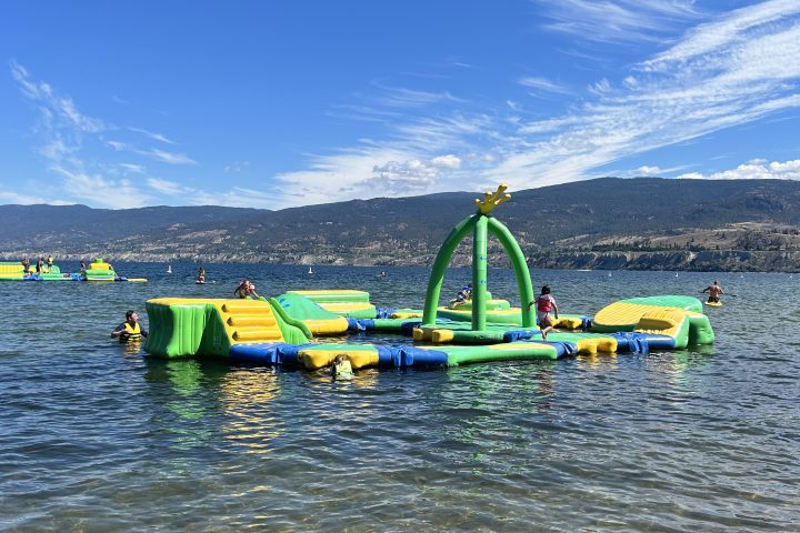 a group of people on a boat in the water